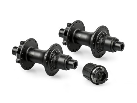 Piasta Reel v.2, tylna, 135/142x12mm, z standardowym bębenkiem Shimano HG, 32H, czarna anodowana
