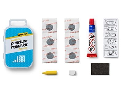 Przejdź do produktu Zestaw łatek do wąskich dętek WELDTITE Cure-C-Cure Puncture Repair Kit For Race (6x Łatka + Klej + Papier ścierny + Kreda + Kredka), Pudełko 12szt.