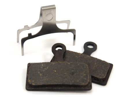 Klocki hamulcowe CLARKS dla SHIMANO (Shimano XTR M985, M987, M988, M975, M965 - XT M785, SLX M666, M675, DEORE M615, Alfine, Clarks M1, M2, M3, CMD-22, CMD-23, CMD-27), Pudełko 20 par, Organiczne (DWZ)